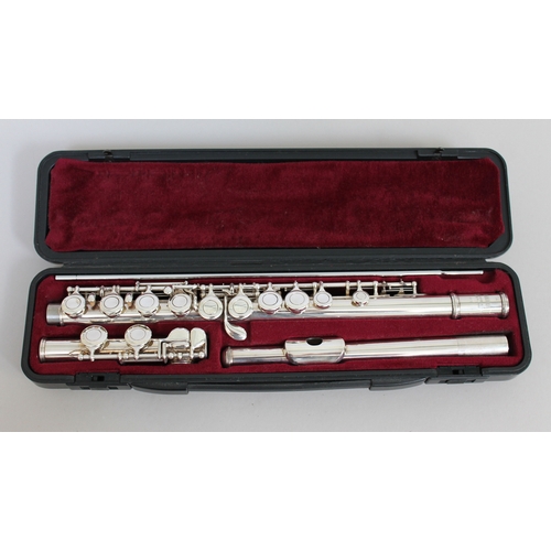 266 - A Yamaha YFL-311 flute outfit serial number 349386, solid silver head and silver plated body.