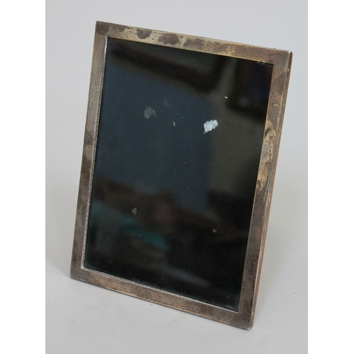 270 - A hallmarked silver photo frame, height 20cm.