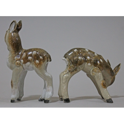 299 - A pair of Keramos Eduard Klabena pottery figures depicting fawns, height 8.5cm & 143cm.