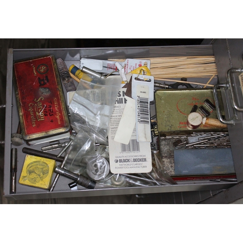 82 - A set of metal file drawers and contents comprising watch spares/repairs and tools, keys etc.