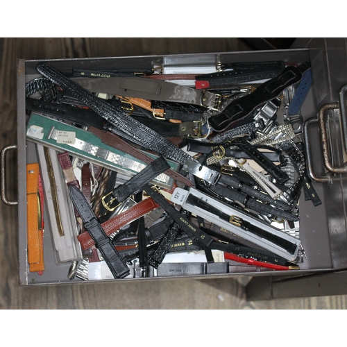 82 - A set of metal file drawers and contents comprising watch spares/repairs and tools, keys etc.