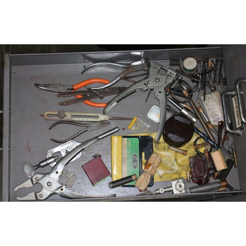 82 - A set of metal file drawers and contents comprising watch spares/repairs and tools, keys etc.