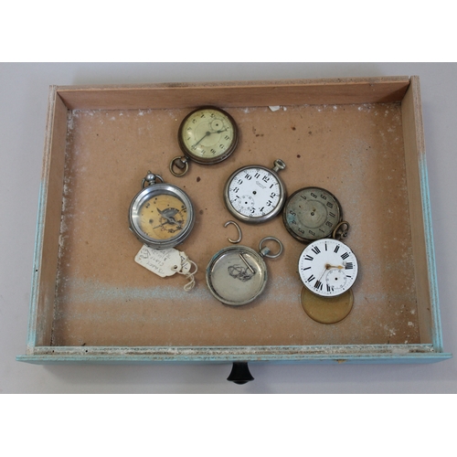 277 - A Dewhursts 'Sylko' cotton bobbin box containing various watch spares.