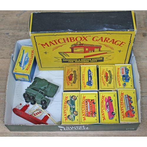 377 - Lesney Matchbox comprising eight boxed model vehicles, Showroom, one empty box and four other models... 