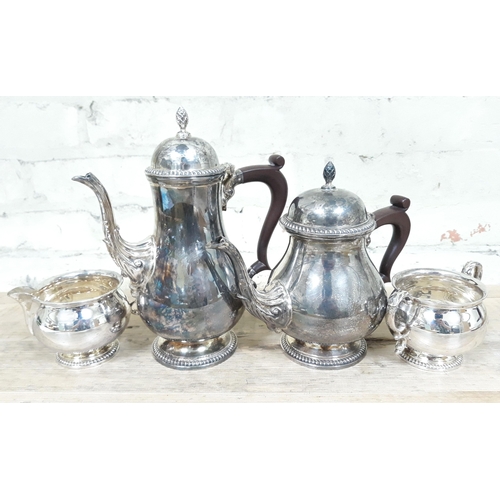 100 - A four piece Georgian style hallmarked silver tea set, gross wt. 54oz.