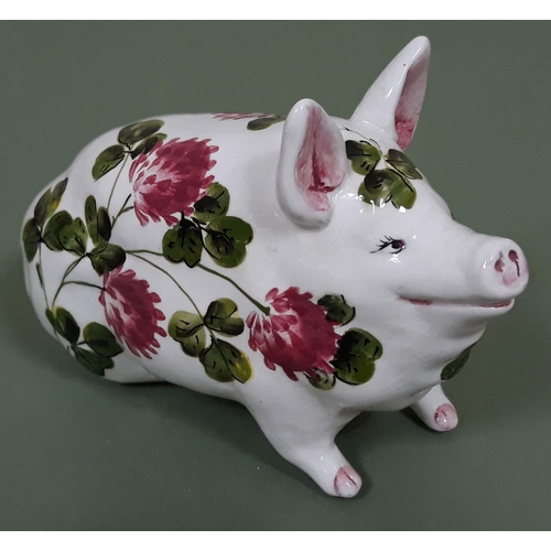 392 - A Wemyss pottery pig decorated in clover pattern, length 16cm.