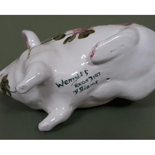 392 - A Wemyss pottery pig decorated in clover pattern, length 16cm.