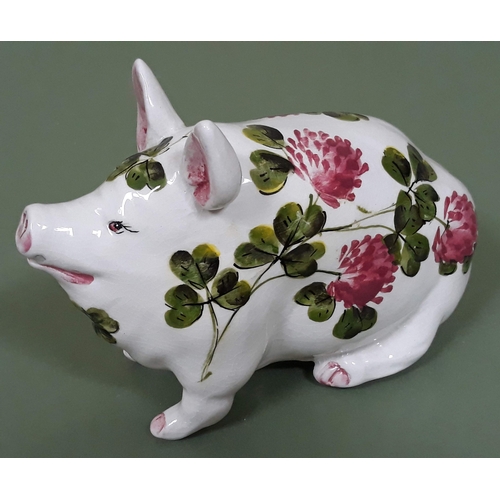 392 - A Wemyss pottery pig decorated in clover pattern, length 16cm.