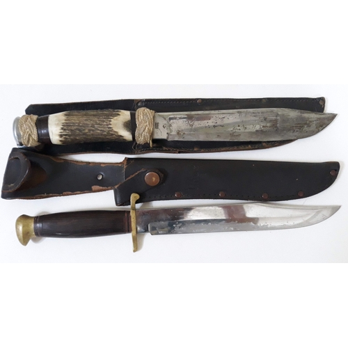 402 - Two hunting knives, one with horn handle, both with leather scabbards, length 33cm & 34cm.