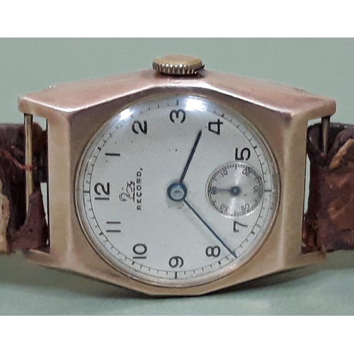 98 - A 9ct gold Record wristwatch with leather strap.