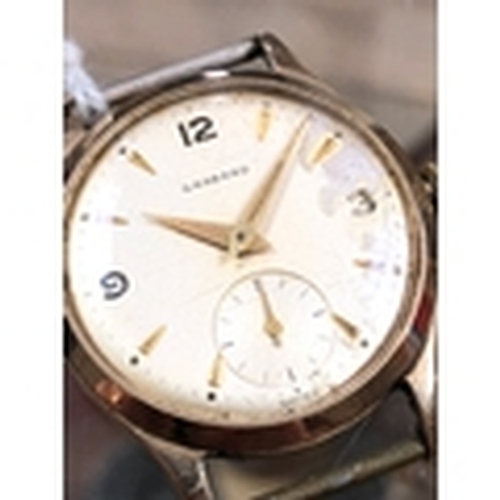 213 - A 9ct gold Garrard wristwatch with white dial, gold markers and arabic numbers with seconds subsidia... 