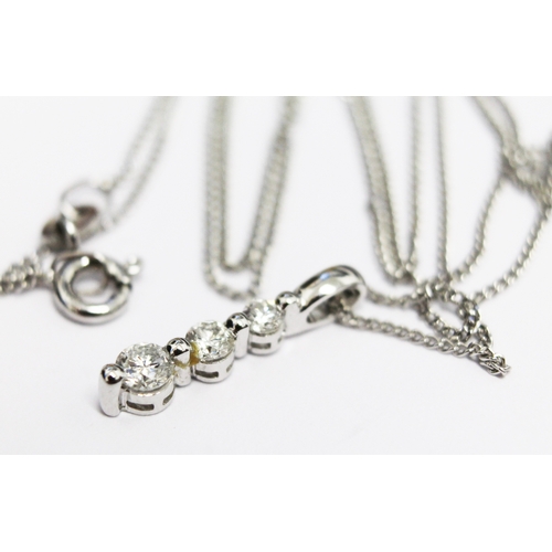 115 - A 9ct white gold chain marked .375 with 18ct gold and diamond pendant marked 750, approx length 40cm... 