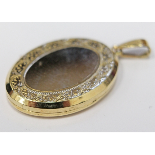 118 - A hallmarked 9ct gold locket pendant, length 33mm, gross weight 9.8 grams