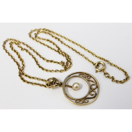 123 - A 9ct gold chain with 9ct gold and seed pearl pendant, approx length 24cm ,gross weight 5.1 grams