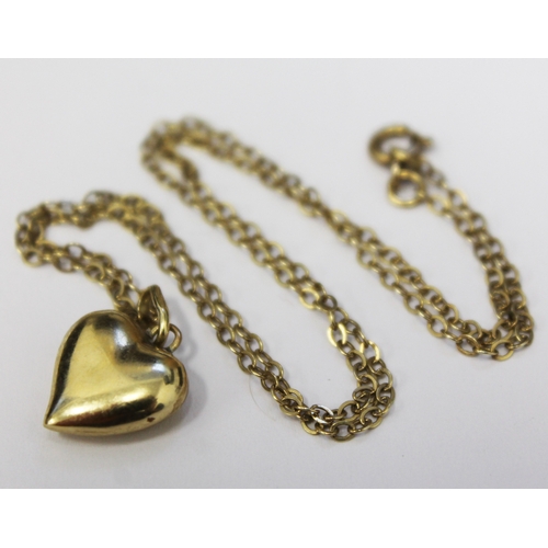 124 - A 9ct gold chain with heart pendant, chain marked .375, heart unmarked, approx length 22.5cm, gross ... 