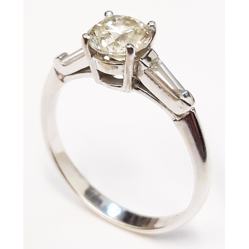 125 - An Art Deco style diamond solitaire ring, the four claw set round brilliant cut diamond approximatel... 