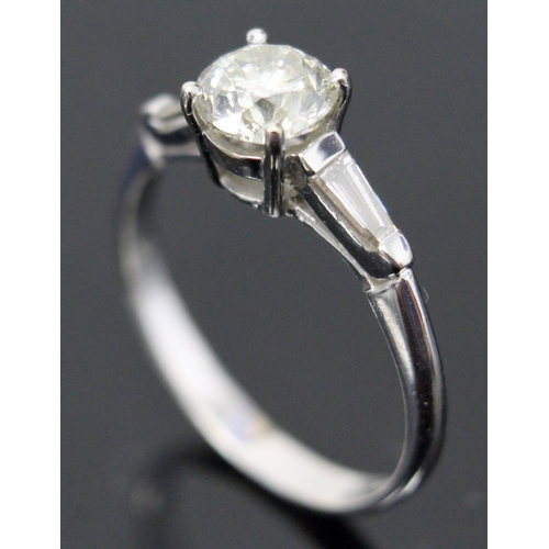 125 - An Art Deco style diamond solitaire ring, the four claw set round brilliant cut diamond approximatel... 