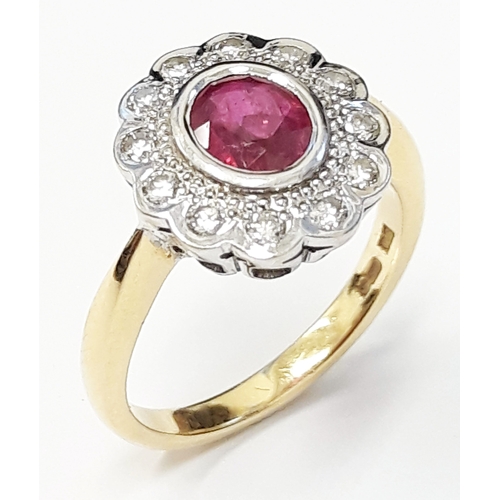 126 - An 18ct gold diamond and ruby cluster ring, the central stone approx 0.75 carats, size O, gross weig... 