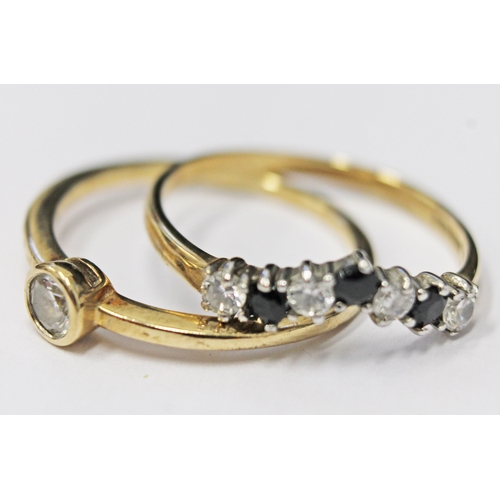 133 - Two hallmarked 9ct gold rings, gross weight 3.0g.