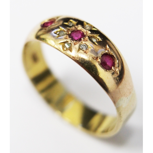 154 - A 9ct gold diamond and ruby ring, size P/Q, gross weight 3.6g.