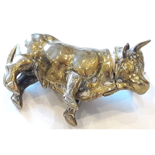 162 - A novelty brass vesta case formed as a bull, length 7cm.