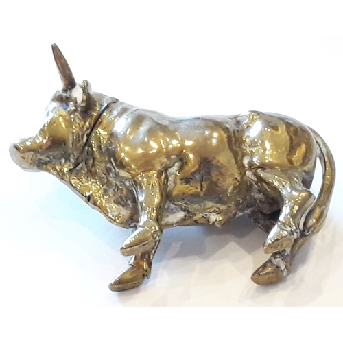 162 - A novelty brass vesta case formed as a bull, length 7cm.