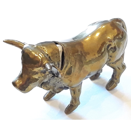 162 - A novelty brass vesta case formed as a bull, length 7cm.