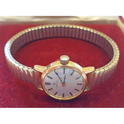 177 - A ladies gold plated Omega wristwatch with box.