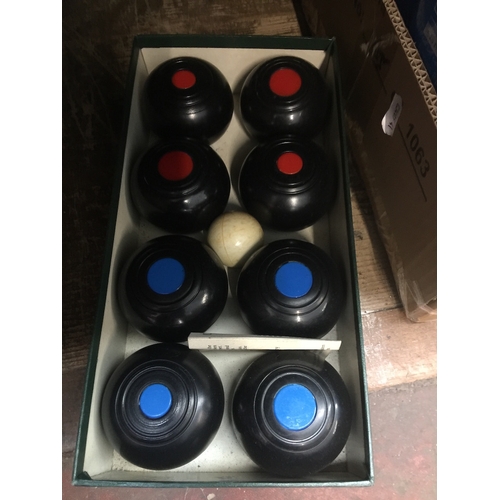 44 - A boxed Townsend croquet set with carpet bowls