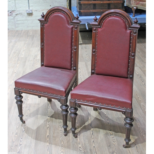 65 - A pair of 19th Century civiv type chairs, height 114cm.