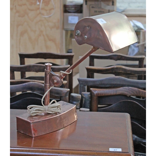 79 - An early 20th century adjustable copper desk lamp.