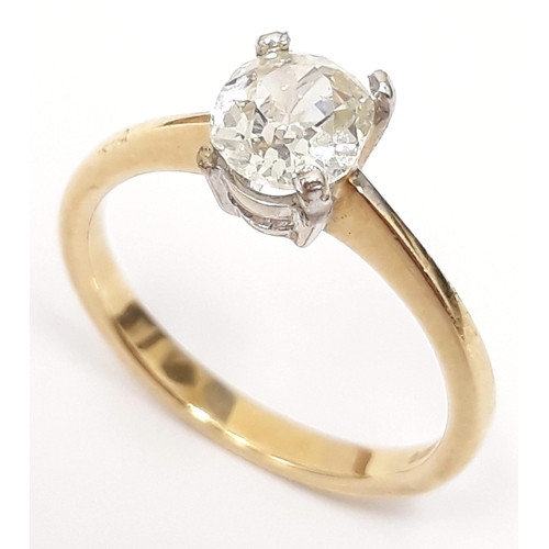 100A - A single stone diamond ring, the oval cut stone approx. wt. 1 carats, band hallmarked 18ct gold, gro... 