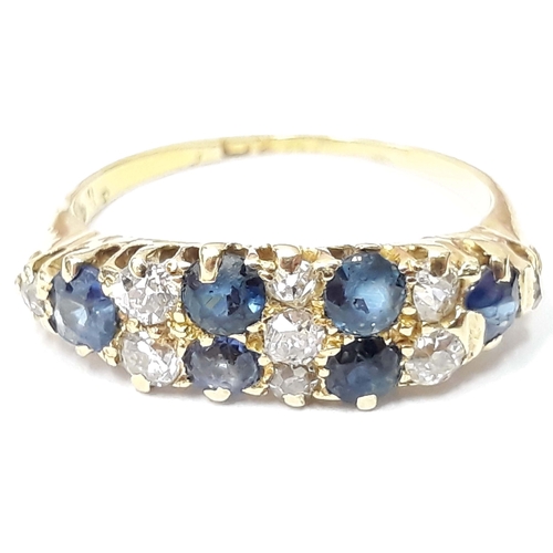 100H - A sapphire and diamnd ring, indistinct 18ct gold hallmarks, gross wt. 2.8g, size M.