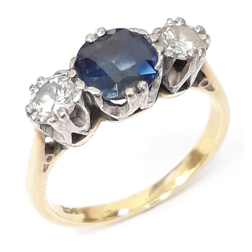 100J - A sapphire and diamond ring, the central stone approx. wt. 1 carat, band marked '18ct', gross wt. 3.... 