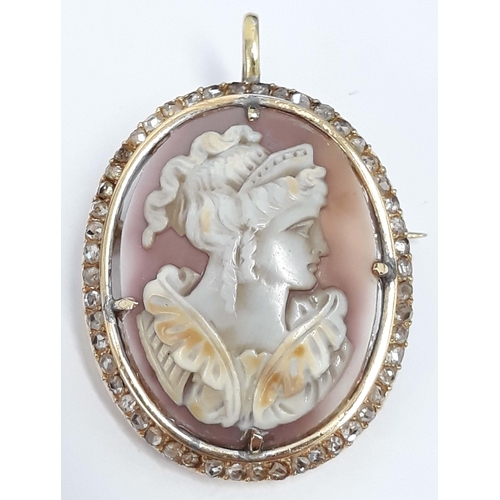 100R - A cameo diamond brooch, length length 39mm, mount unmarked, gross wt. 10.5g.