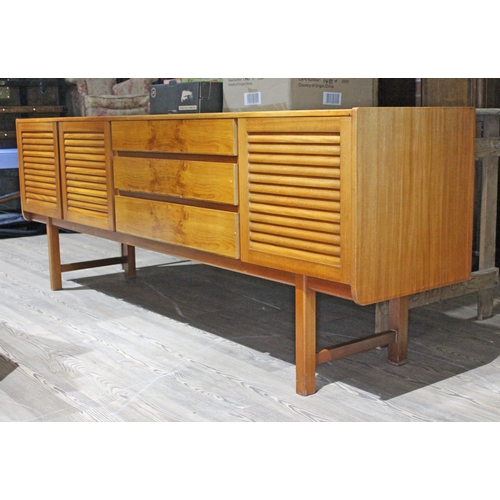 98 - A 1960s McIntosh teak sideboard with yew wood drawer fronts and slatted panel doors, length 209cm, d... 