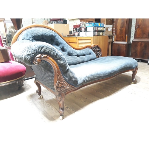 99A - A Victorian walnut chaise lounge.