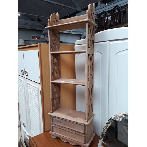 598 - A narrow pine bookcase/rack