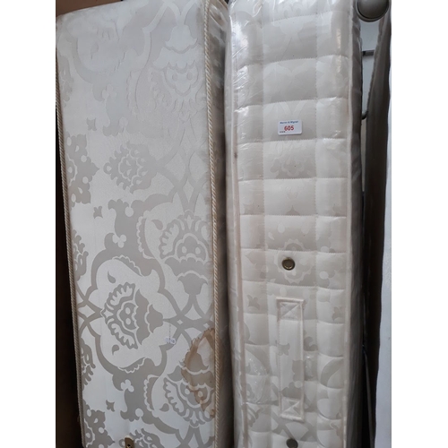 605 - A double divan cream floral patterned bed