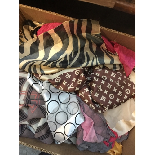 734 - A box of various silk and other scarves.