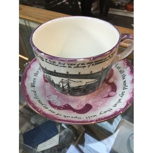 871 - A Grays Pottery cup and saucer commemorating the the building of the Iron Bridge of the river Wear.