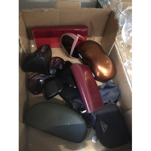 945 - A box of designer sunglasses and purses