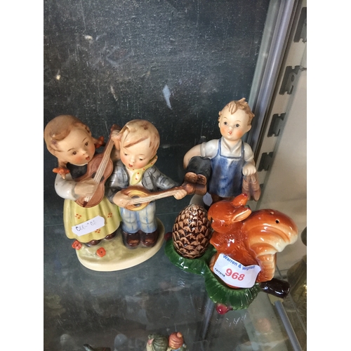 968 - 2 Hummel figurines and a Hummel salt and pepper squirrel