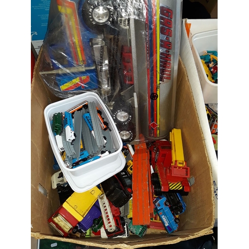 183 - A box of misc toys, cars, planes, trucks, micro trains with tracks, etc