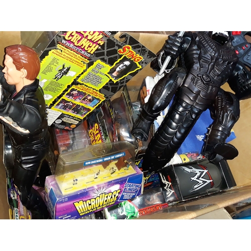 185 - A box of WWF figures, Terminator, etc