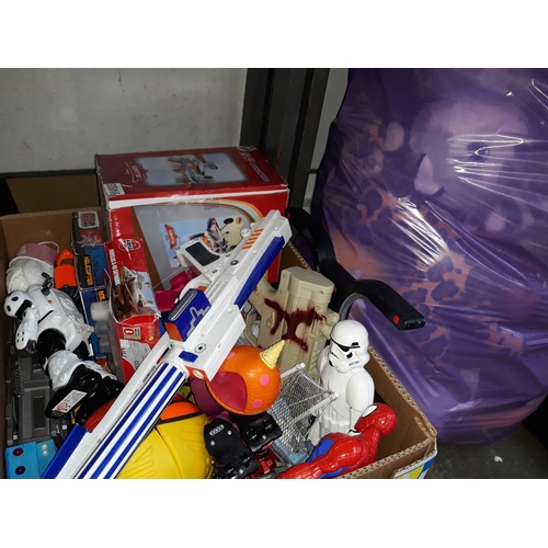 246 - A box of various toys including Star Wars, Spiderman, etc and a bag of soft toys