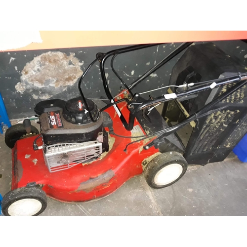 335 - A Champion petrol lawn mower