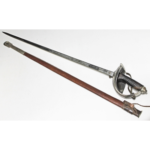 344 - A British WWI 1912 pattern cavalry officers sword, leather grip and scabbard, blade length 88cm.