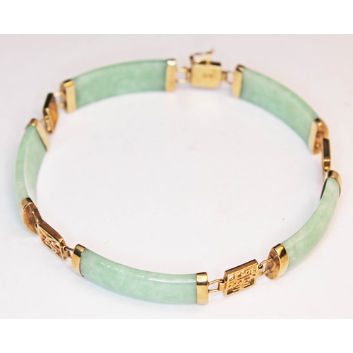 173 - A Chinese gold and jade bracelet, marked 9K', gross weight 12.4g, length 19cm.