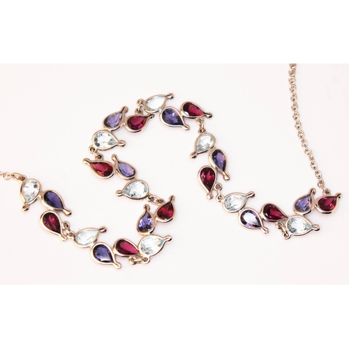 180 - A hallmarked 18ct white gold multi-coloured stone necklace, gross weight 10.7g, length 45cm.